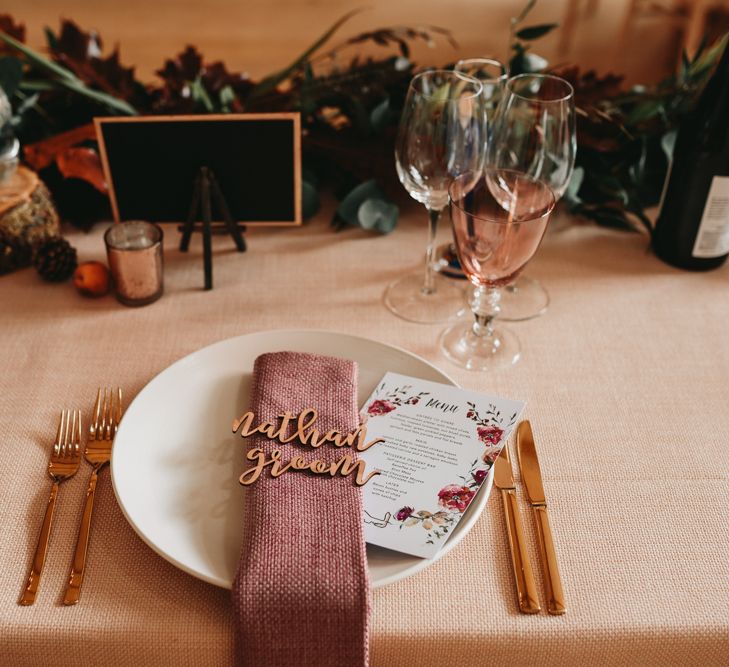 Place setting with napkin and lazer cut name place 