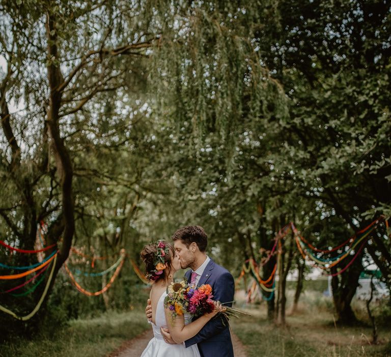 Bride and groom kissing at Thurstons Farm wedding