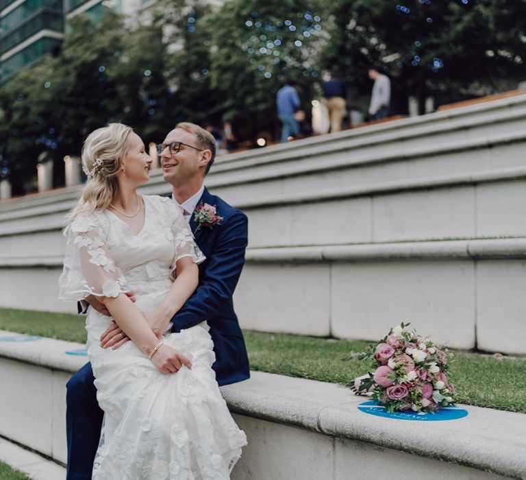 Bride and groom at London wedding with London wedding bus