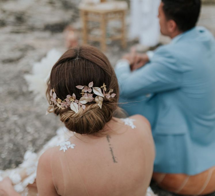 Bridal undo with gold hairpiece for pink and blue wedding