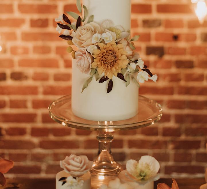 Floral toffee apple and cinnamon wedding cake by Love Wedding Cakes