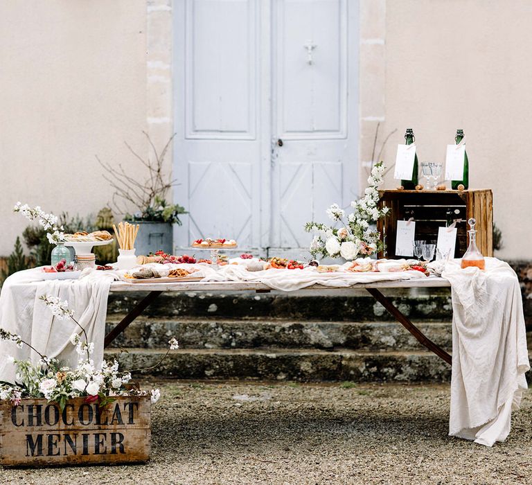 Rustic chic wedding grazing table at Chateau de la Ruche