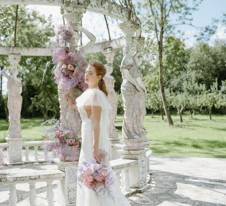 Bride walks during Spring time in the sunshine