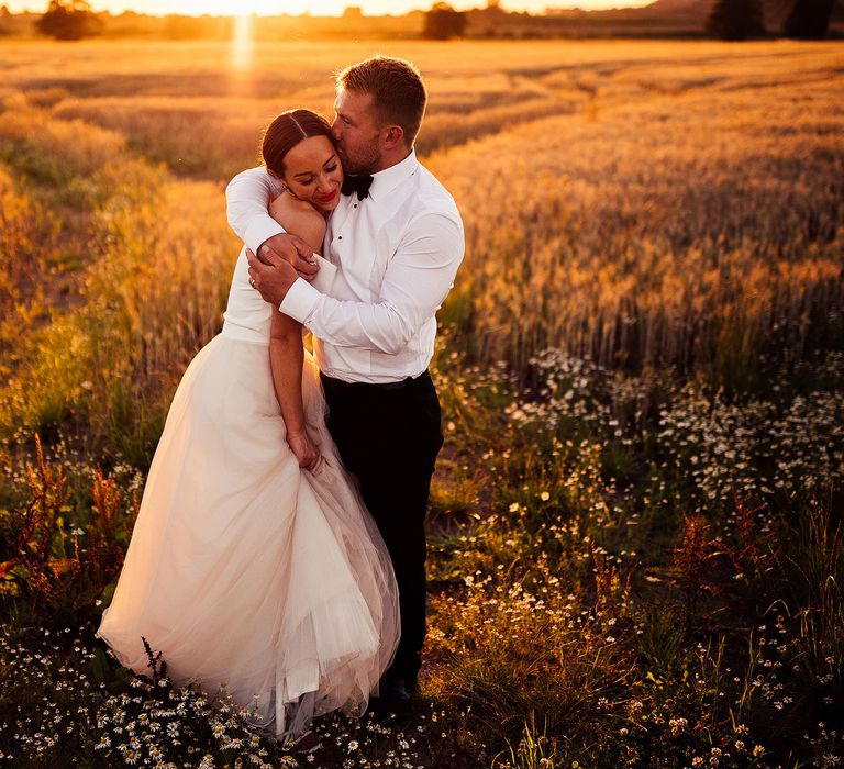 Sunset portraits for bride and groom