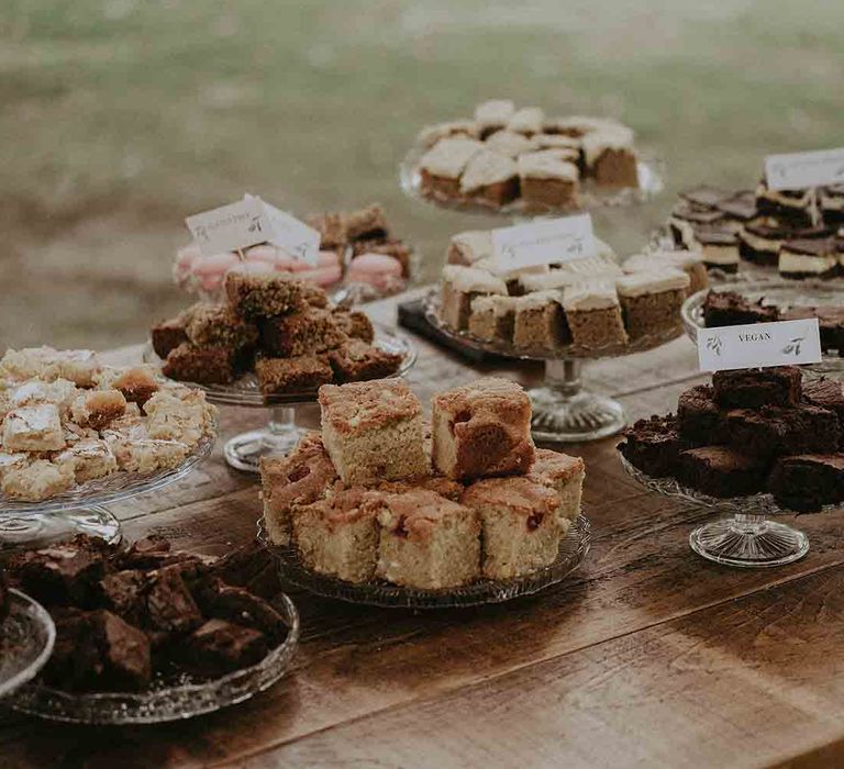 DIY cake table with bakes from family and friends