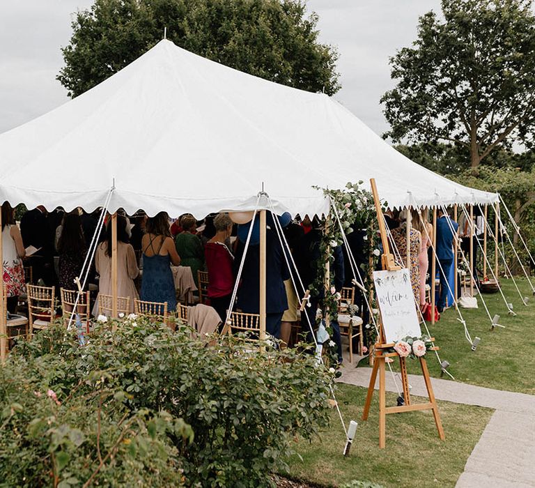 Marquee for Christian wedding in family garden in Sussex