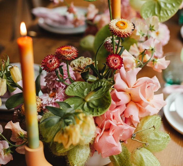 pink roses, green anthuriums and ombre candle wedding flowers and table decor 