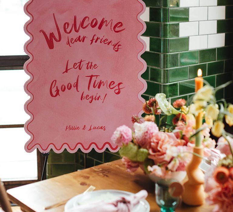 pink and red wedding welcome sign 