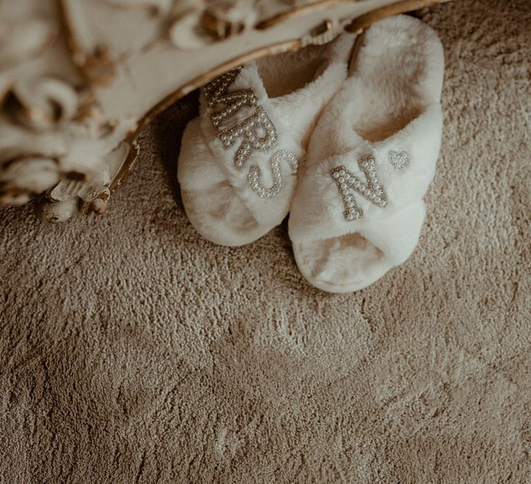 White fluffy bridal slippers with pearl personalisation 