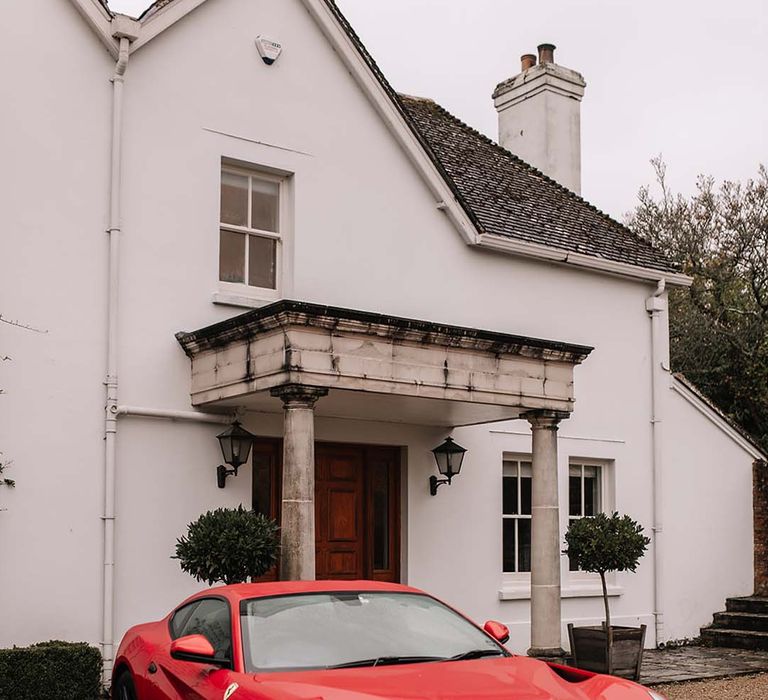 Cherry red Ferrari wedding car