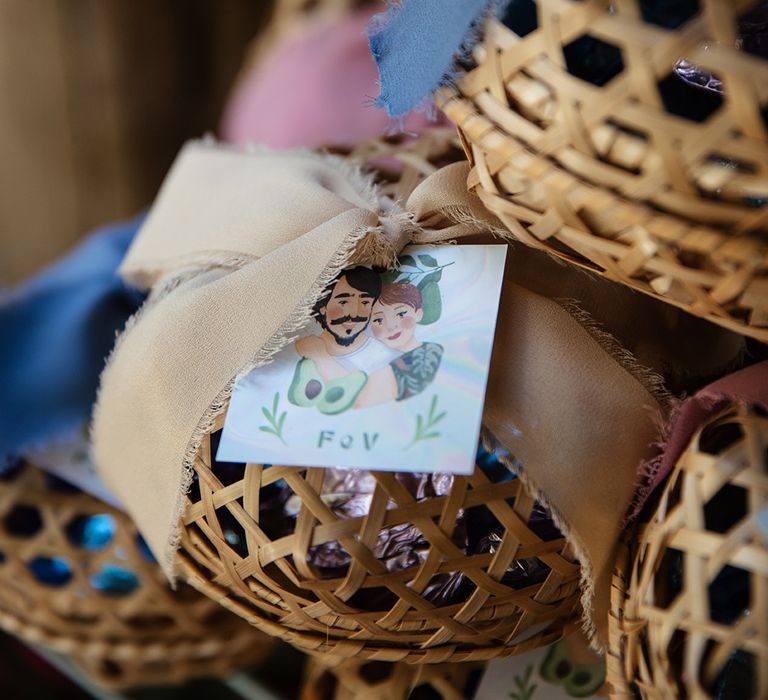 Handmade wedding favours with personalised favour tags showing the illustration of the couple 