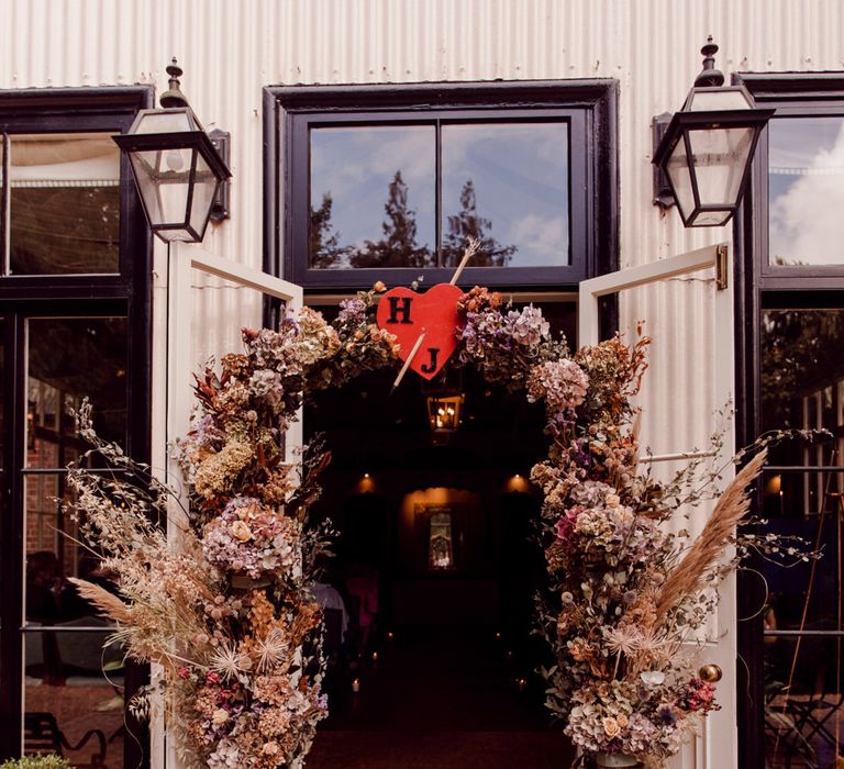 Gorgeous wedding flower arch way for entrance