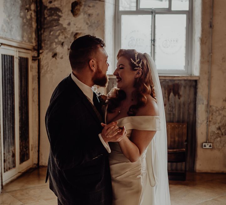 Bride with vintage wedding hair, hair slide and wedding veil at Micro wedding 