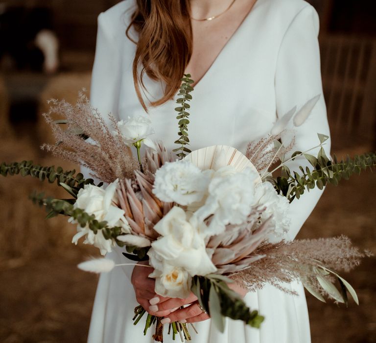 The bride's wedding flowers were by Botanics Florist