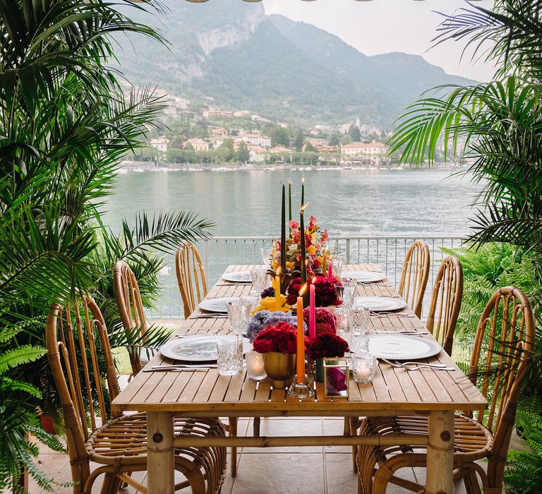 Colourful wedding table setting in front of Lake Como in Italy