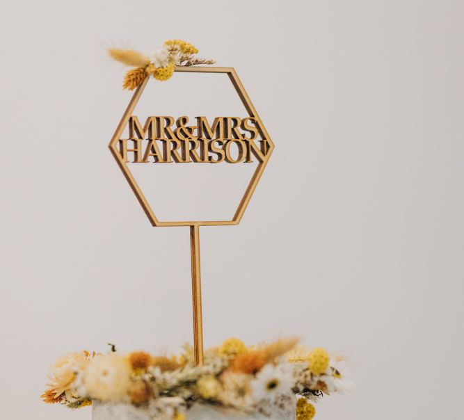 Hexagon wooden wedding cake topper with couples names 