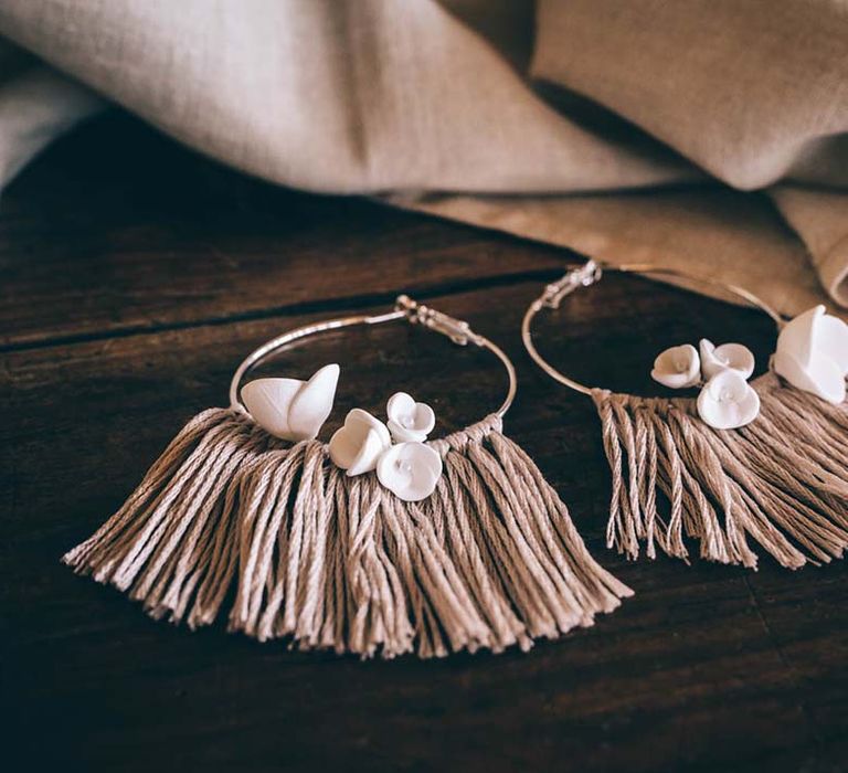 Hoop earrings with ceramic flowers and macrame tassels 