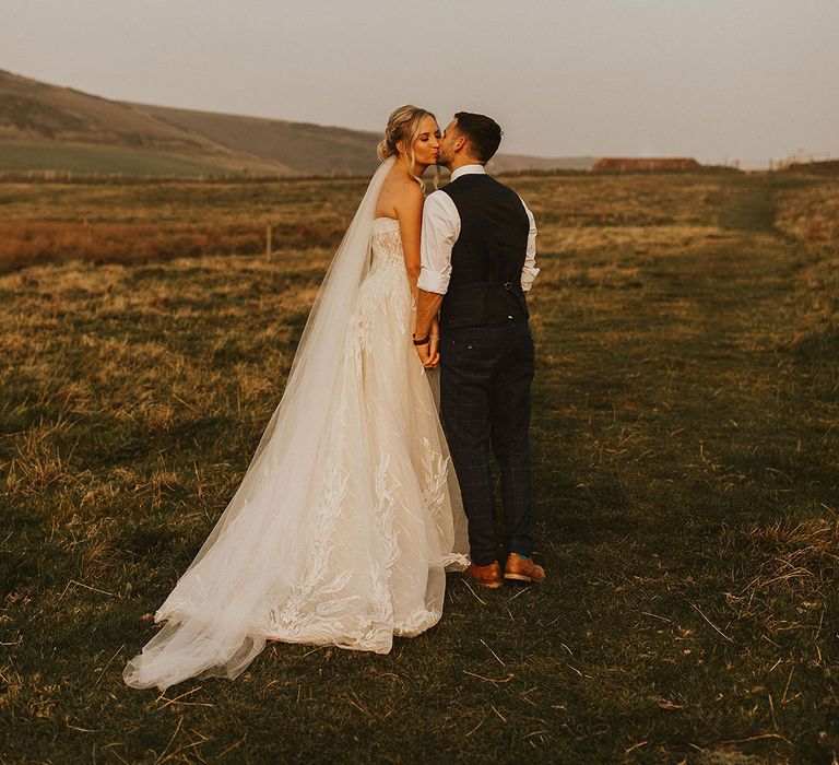 Bride and groom at East Afton Farmhouse wedding