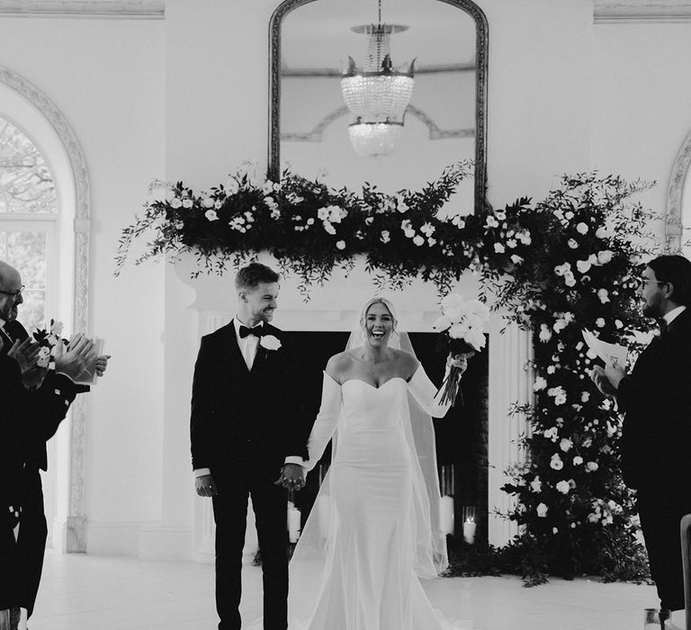 Black and white portrait of the bride and groom just married at their Northbrook Park civil ceremony 