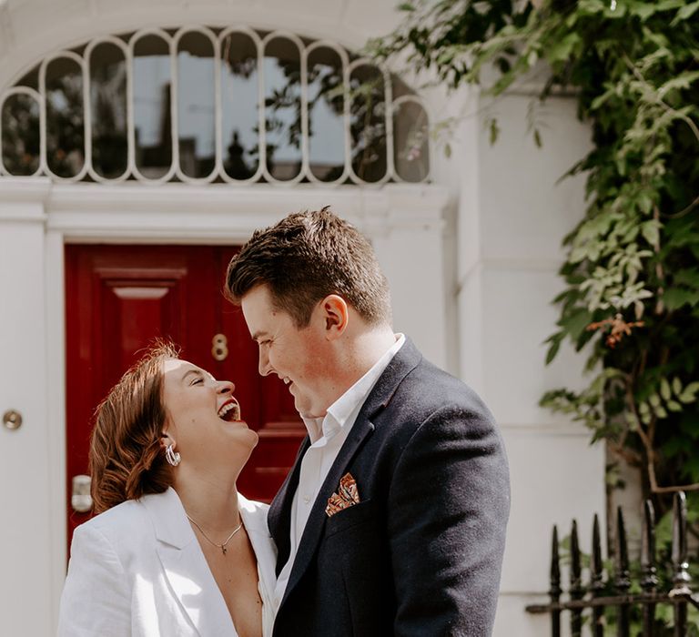 Intimate bride and groom portrait at town hall wedding 