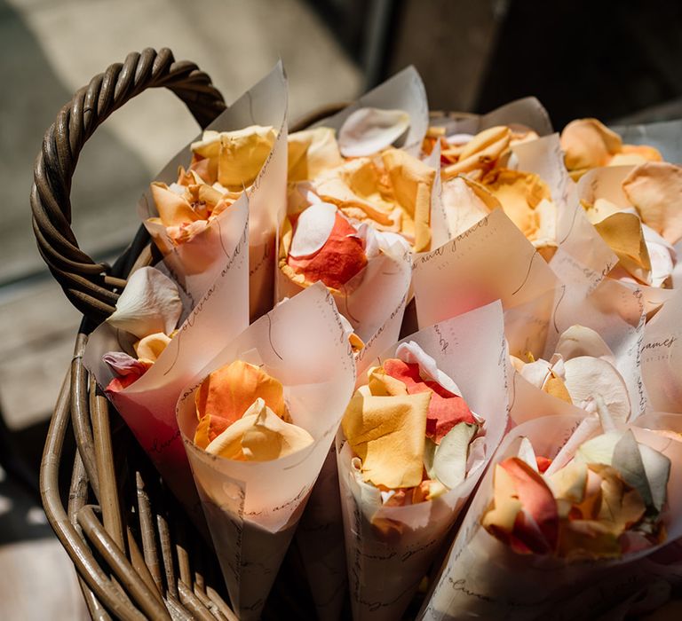 Rose petal confetti in a wicker basket