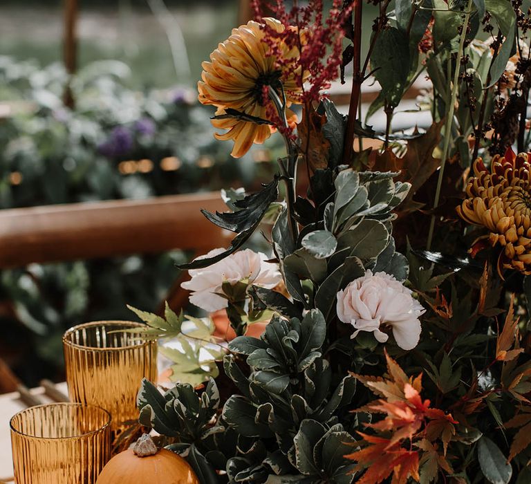 Mini pumpkin decor for an autumnal tablescape for a glasshouse reception 