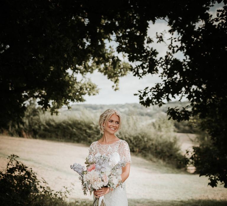 Delicate short sleeve lace boho wedding dress