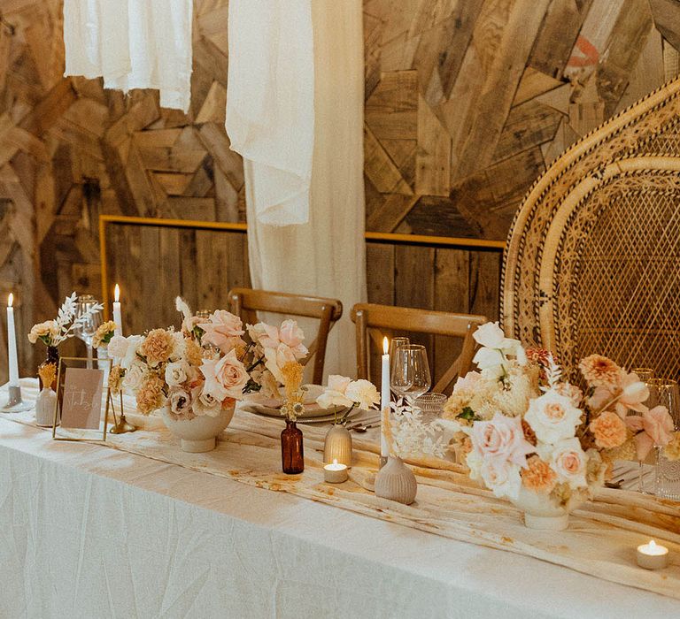 muted colour palette drapes, flowers and wedding table decor at The Canary Shed 