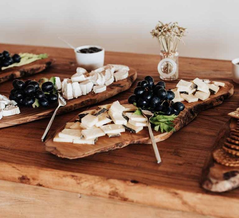 Grazing platters on wooden slates at Brickhouse Vineyard Devon wedding venue 