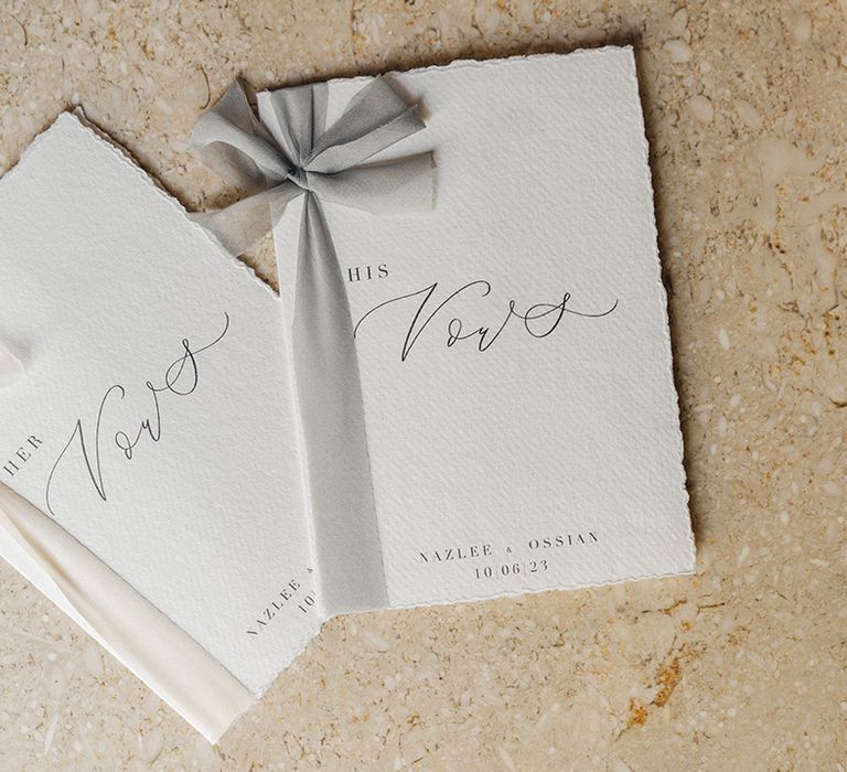 his and hers wedding vow booklets with bows 