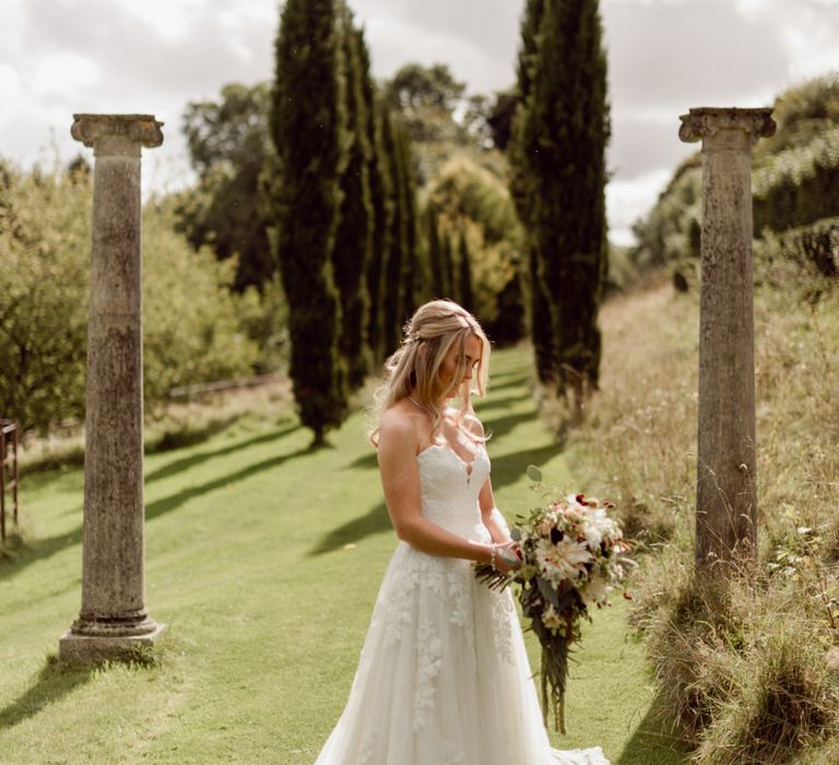 Bride in strapless lace wedding dress