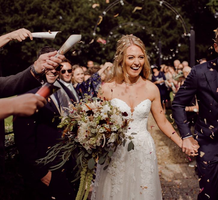 Confetti exit for bride and groom