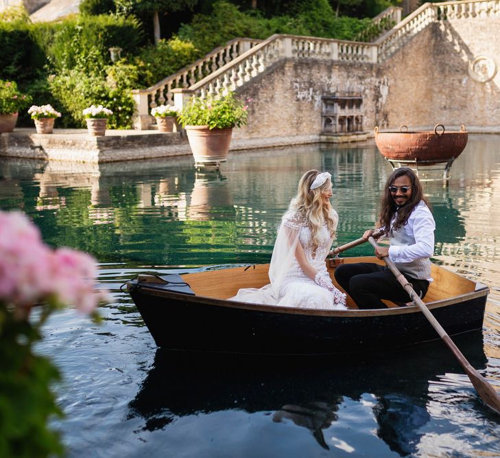 Bride and groom on the boat at The Lost Orangery