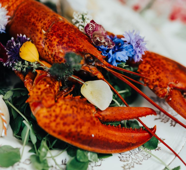 Lobster with edible flowers for the picnic wedding 