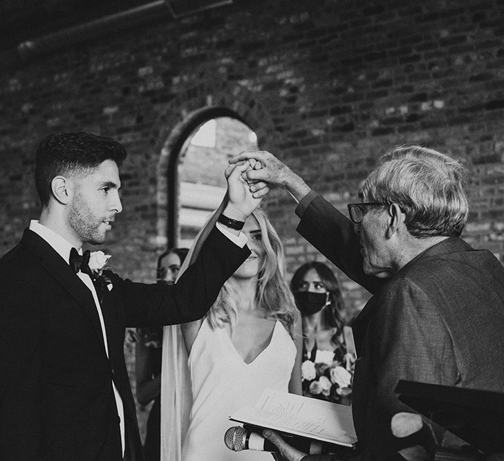 Pastor performing the wedding ceremony at Gas Street Church in Birmingham 