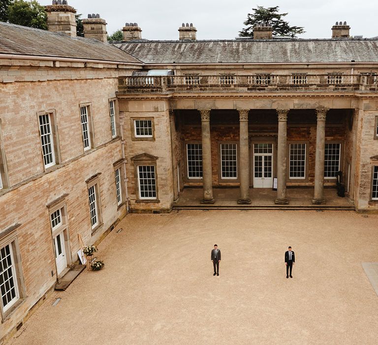 Grooms at their wedding venue 