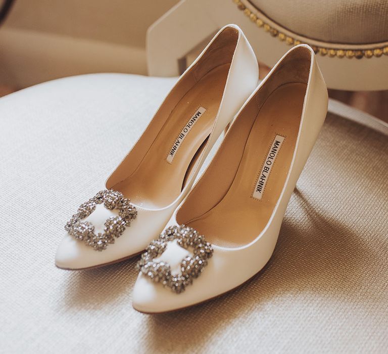 White Manolo Blahnik heels complete with embellishment to the front