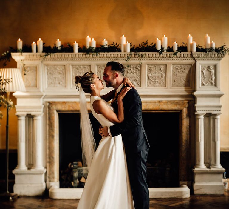 Hampton Court House wedding country house in Surrey with traditional wedding outfits 