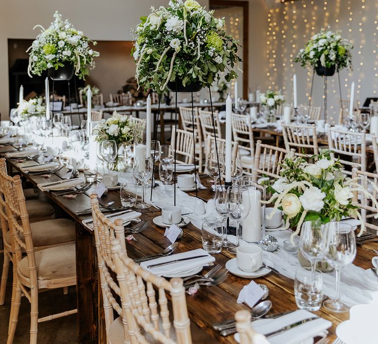 Black and white monochrome wedding table decorations with disco balls at Houchins wedding venue 