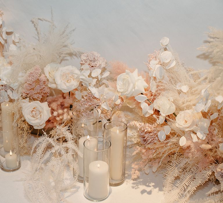 Pale pink and white boho wedding flowers with dried pampas grass 