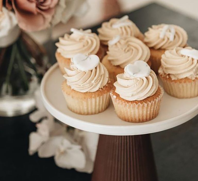 Wedding cupcakes displayed on a cake stand