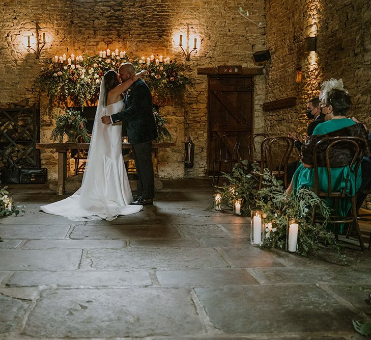 Intimate autumn wedding ceremony at Cripps Barn with natural wedding flowers