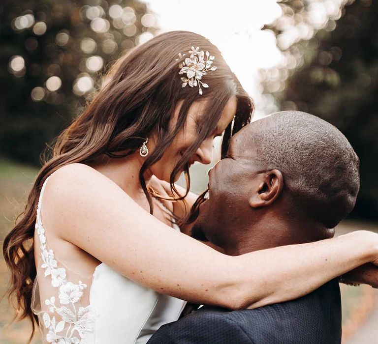 Bride & Groom kiss at their Cefn Tilla Court Wedding 