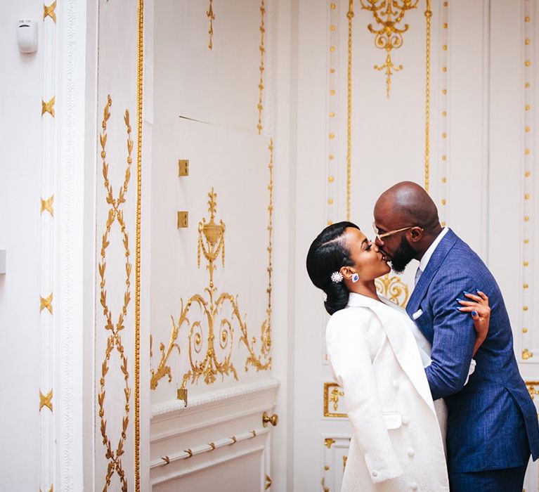 Bride & groom kiss on their wedding day