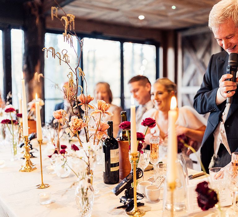 Father of the bride reads out his wedding speech