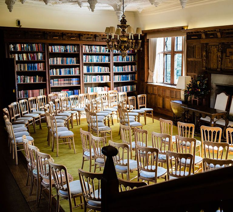 Brinsop Court Manor House and Barn wedding ceremony room in a library 