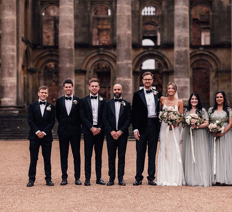 Sequin short sleeve grey bridesmaid dresses with the groomsmen in black tie for Hanley Hall wedding in Worcestershire 