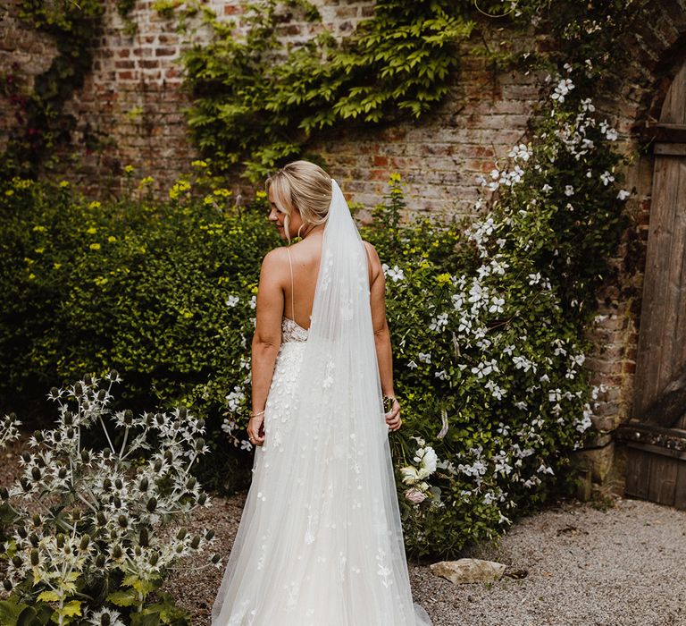 Middleton Lodge Estate classic wedding with the bride in a floral 3D wedding dress and matching veil 