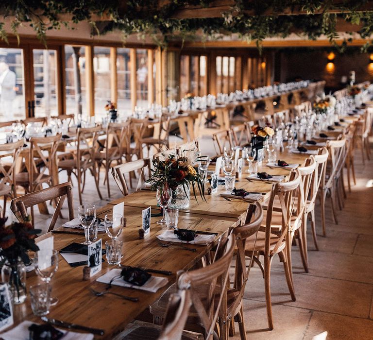 Old Gore Barn wedding venue in the Cotswolds with cosy and rustic wedding tablescape for autumn wedding in September 