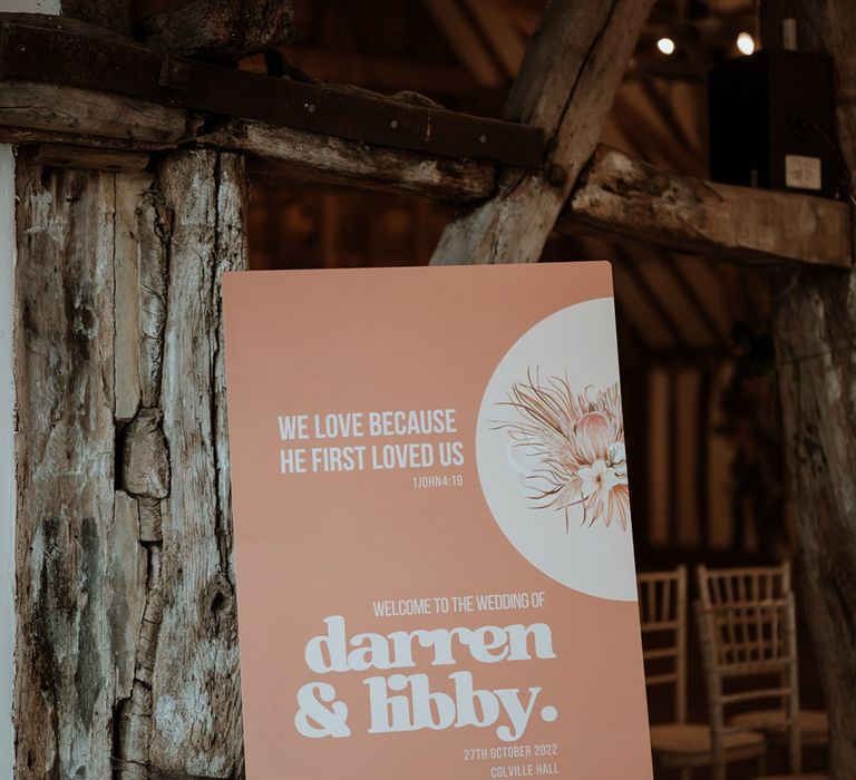 Terracotta and peach wedding welcome sign with Bible quotation 